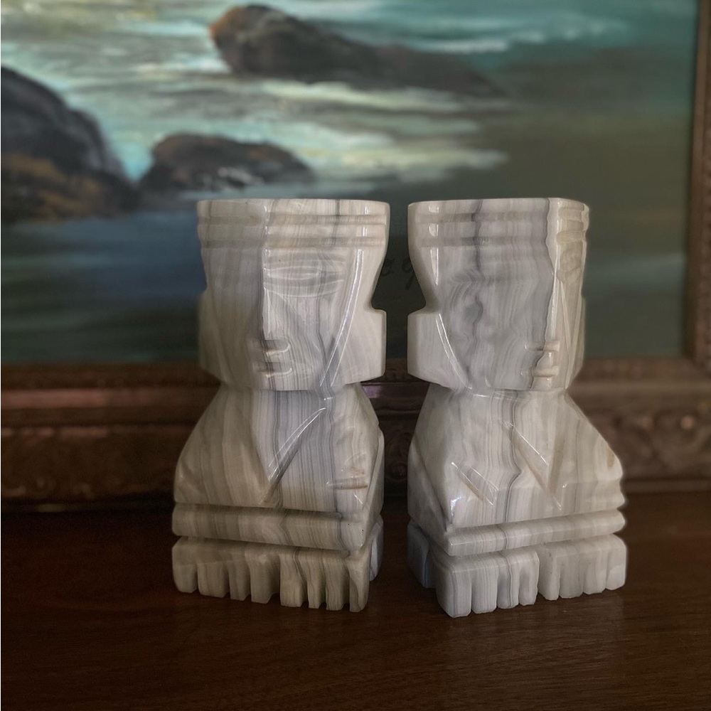 Marble tiki bookends.